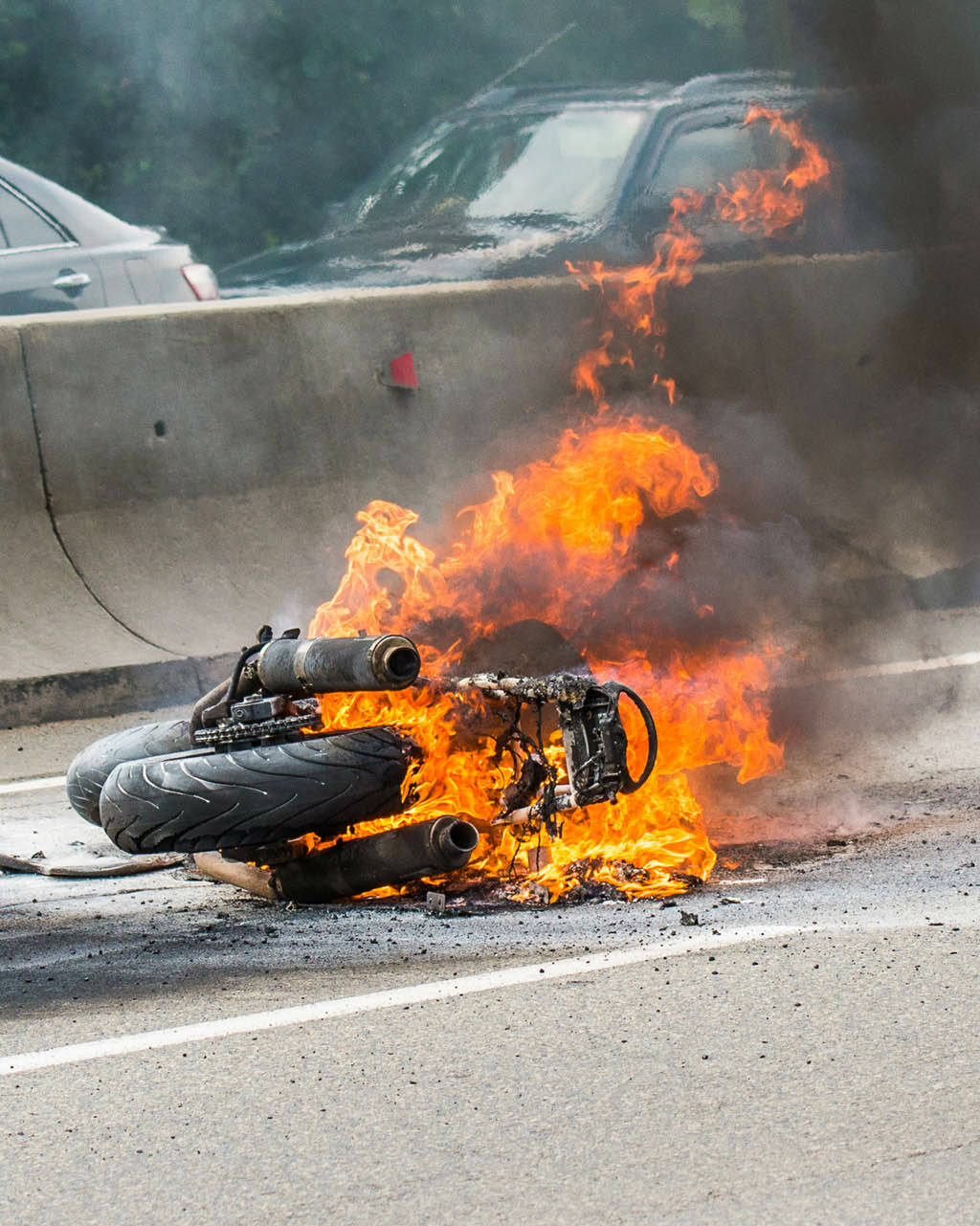 The motorcycle burns.